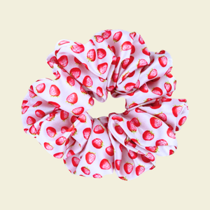 Scrunchie with strawberry pattern on a white background